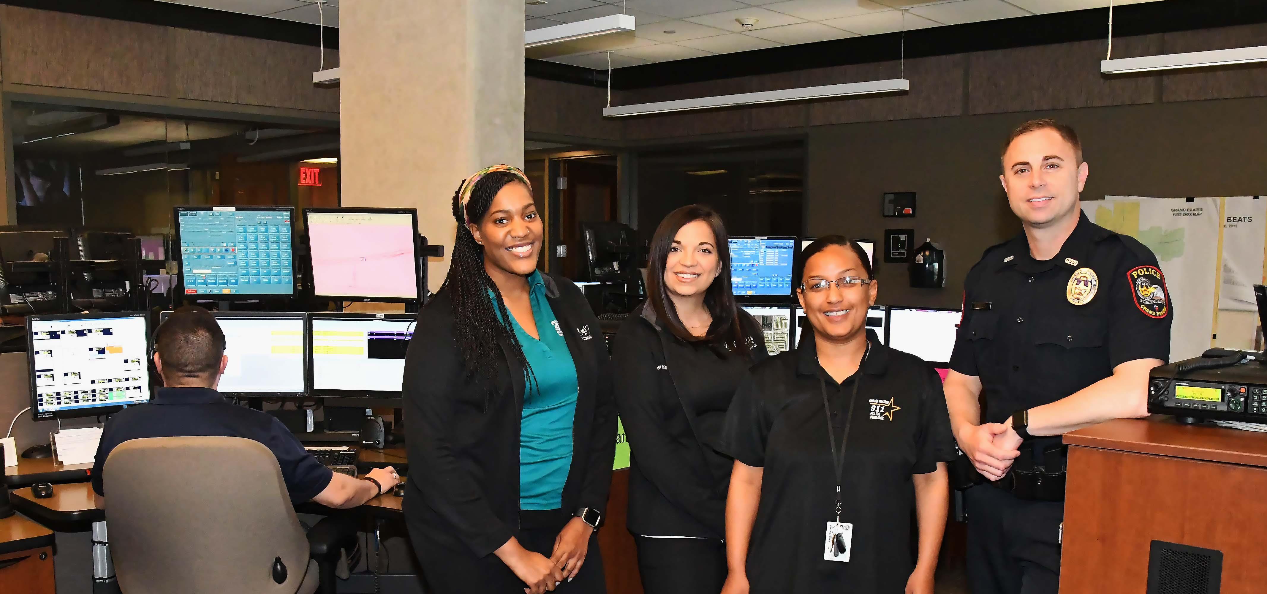 911 dispatchers posing for a picture